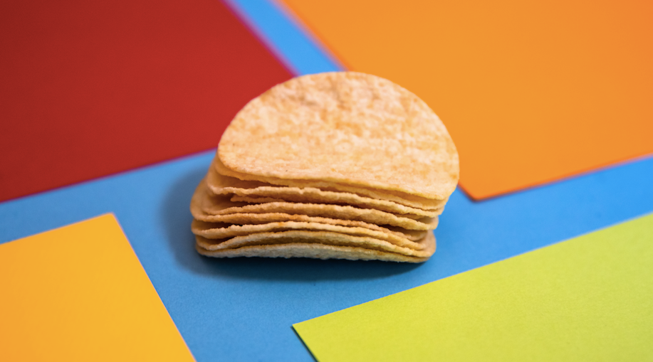 Stack of chips next to coloured paper